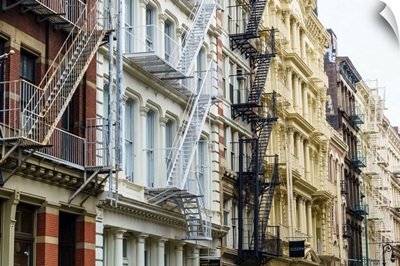 Old buildings and fire escapes in the Cast Iron District of SoHo, New York City