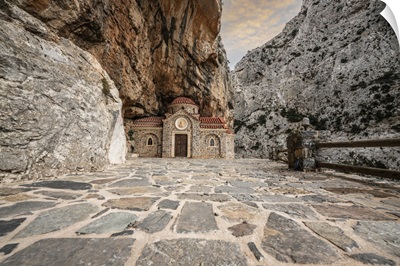 Orthodox Chapel Agios Nikolaos Nestled In Rocks In Kotsifou Canyon, Crete Island, Greece