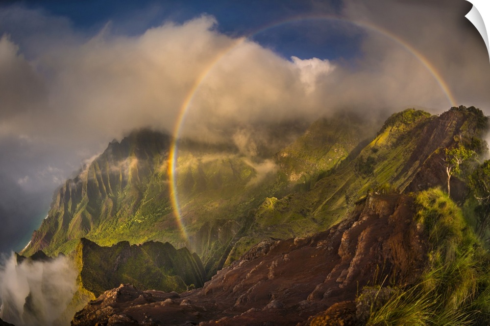 A 180 degree rainbow formed by the clouds over the Kalalau Valley on Kauai's west coast in the evening, Napali Coast State...