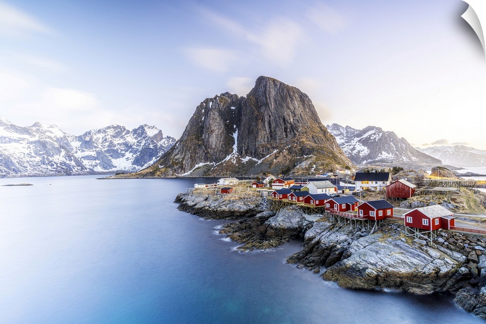 High angle view of traditional red Rorbu cabins in the fishing village of Hamnoy at dawn, Reine, Lofoten Islands, Norway, ...