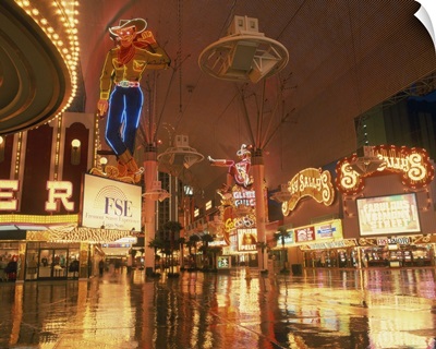 Reflections of neon lights and signs along Fremont Street in Las Vegas, Nevada