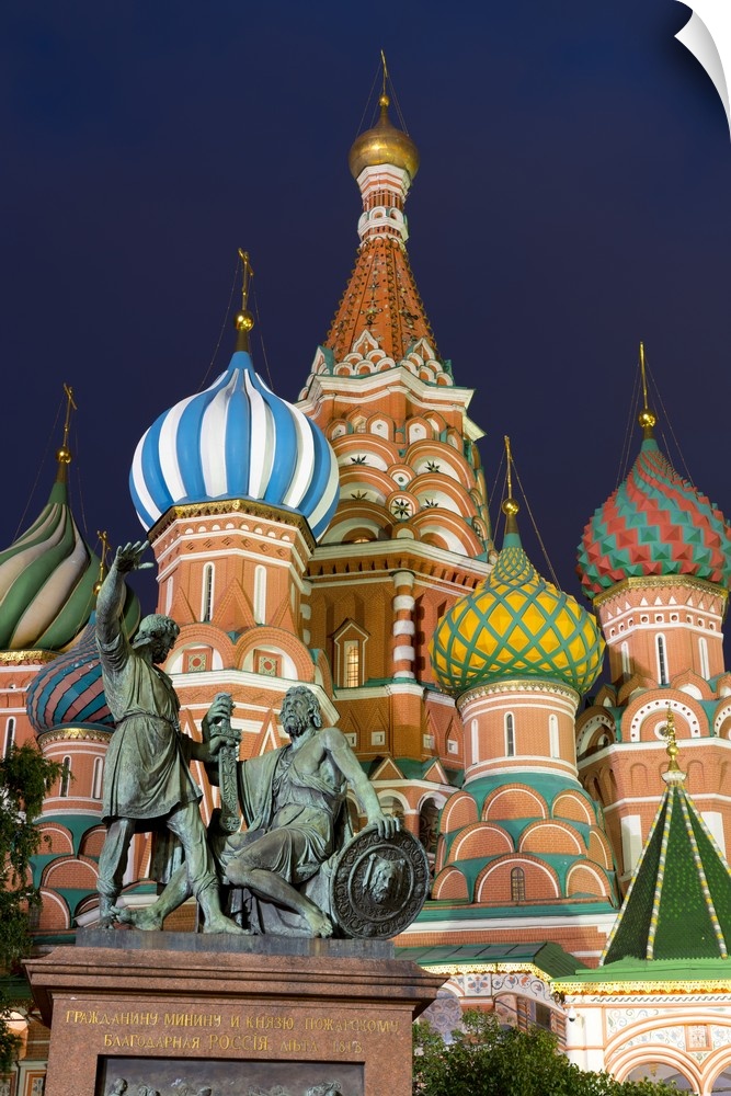 St. Basil's Cathedral and the statue of Kuzma Minin and Dmitry Posharsky lit up at night, Moscow, Russia