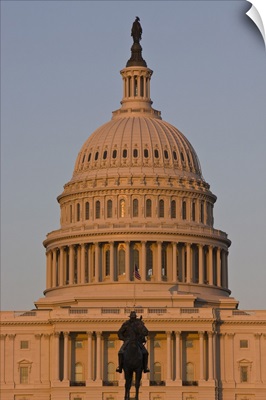 Statue in front of the dome of the U.S. Capitol Building, evening light, Washington D.C