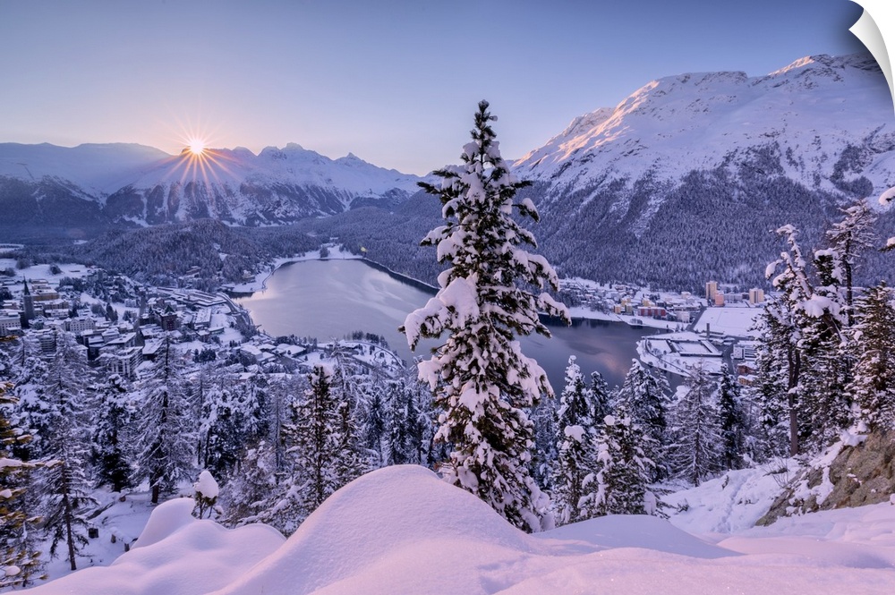 Sunrise over village and Lake of St. Moritz covered with snow, Engadine, Canton of Graubunden, Switzerland, Europe