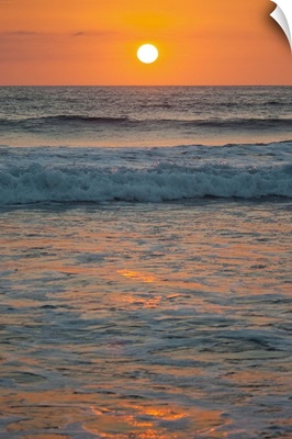 Sunset at Playa Guiones surfing beach, Nosara, Costa Rica