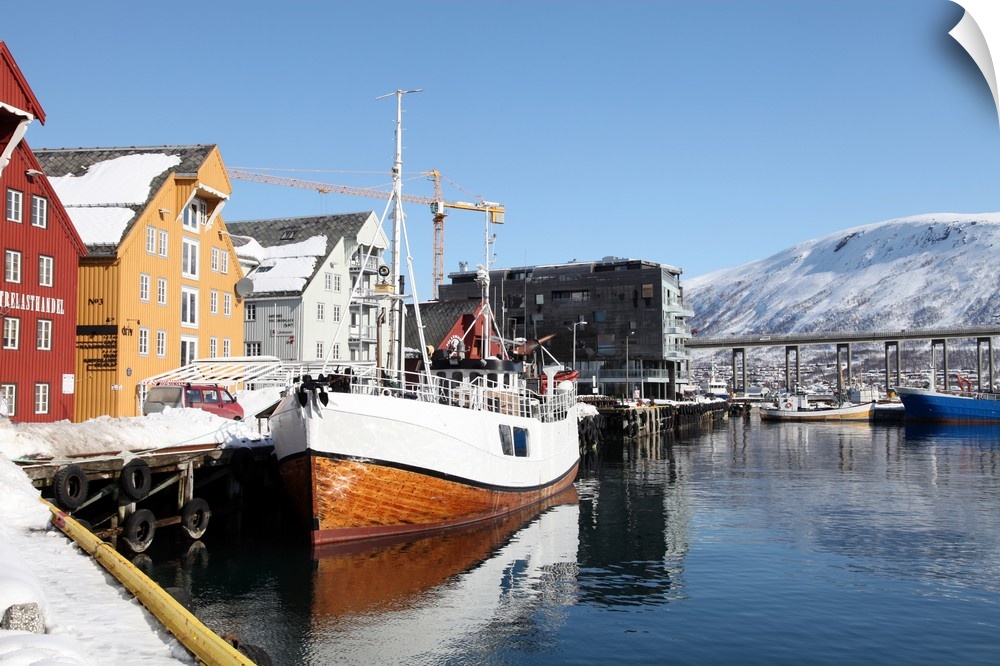 The whaler that used to go to Svalbard, with warehouses behind that have been converted into offices, Tromso, Troms, Norwa...