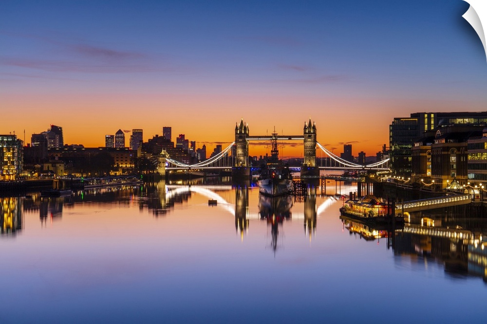 Tower Bridge, HMS Belfast and reflections in a still River Thames at sunrise, London, England, United Kingdom, Europe