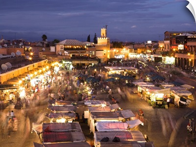 View Over Djemaa El Fna At Dusk With Foodstalls And Crowds Of People, Marrakech, Morocco