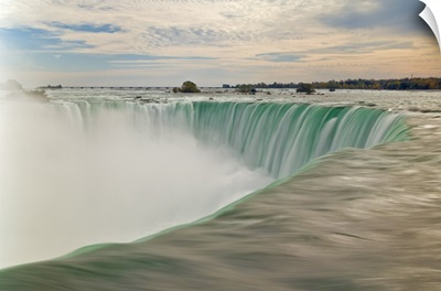 Water at the top of the Horseshoe Falls on the Niagara River, Ontario, Canada