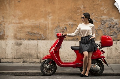 Young Woman Waiting By Vespa Moped, Rome, Lazio, Italy