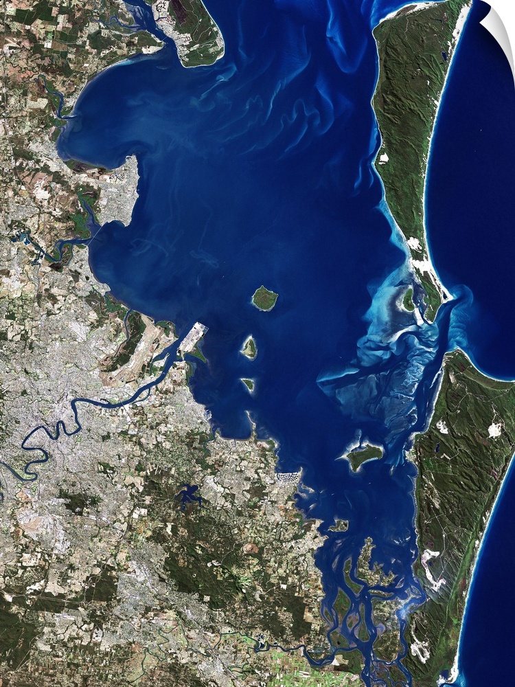 Brisbane, Australia, satellite image. North is at top, water is blue, shallow coastal areas are light blue, urban areas ar...