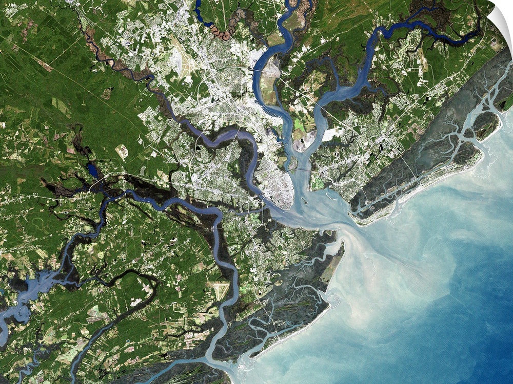 Charleston, South Carolina, USA, satellite image. North is at top, water is blue, shallow coastal areas are light blue, ur...