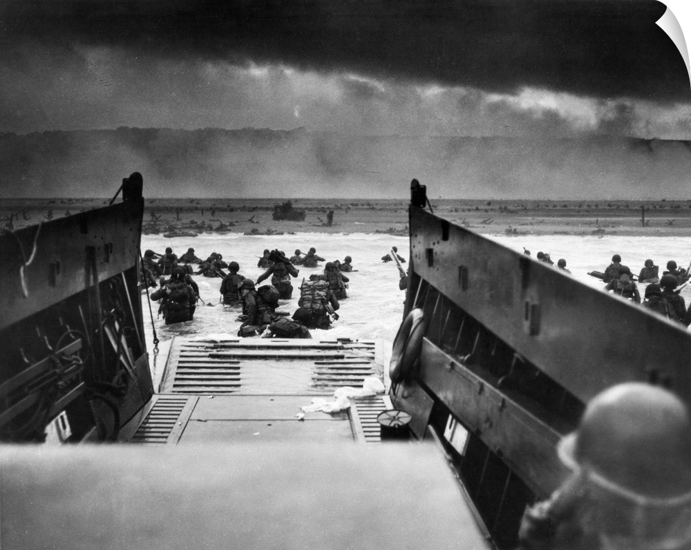 D-Day landings. US Coast Guard-manned LCVP disembarking troops on the morning of 6 June 1944 at Omaha Beach in one of the ...