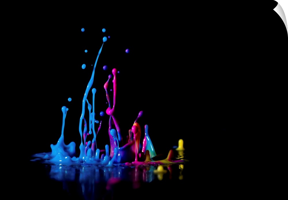 Multicoloured splashes against a black background,