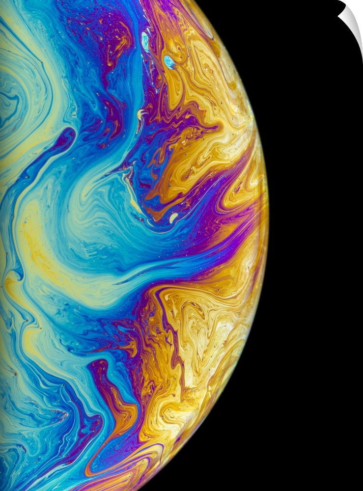 Soap bubble colours. The movement in the thin film is due to the interaction between gravity and buoyancy in the liquid. T...