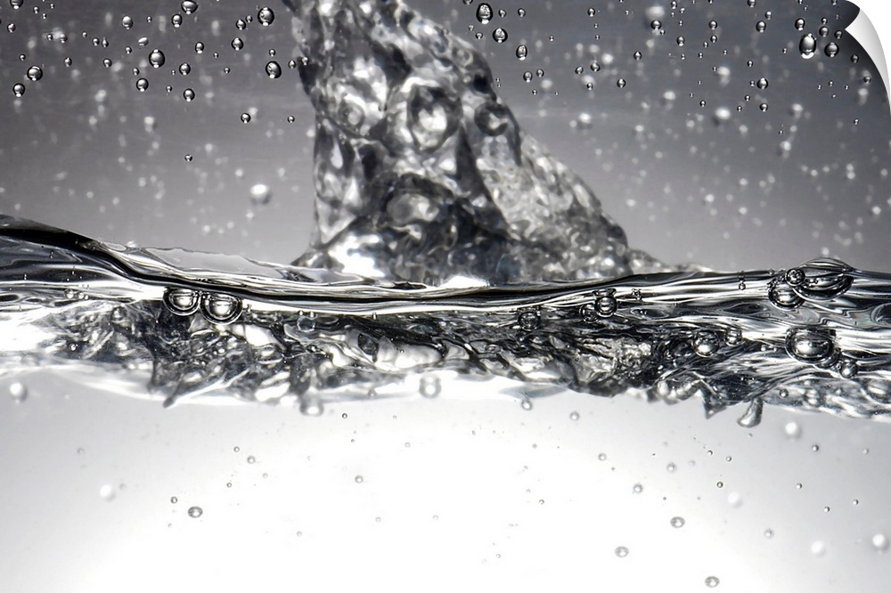 Water, high-speed photograph. Close-up of turbulent water showing many bubbles produced in the process.