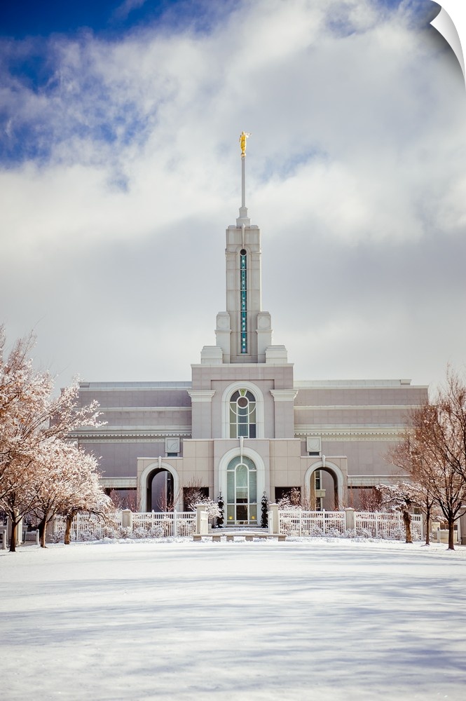 The Mount Timpanogos Utah Temple is located in American Fork, Utah. Its bright exterior offsets it from the hills behind i...