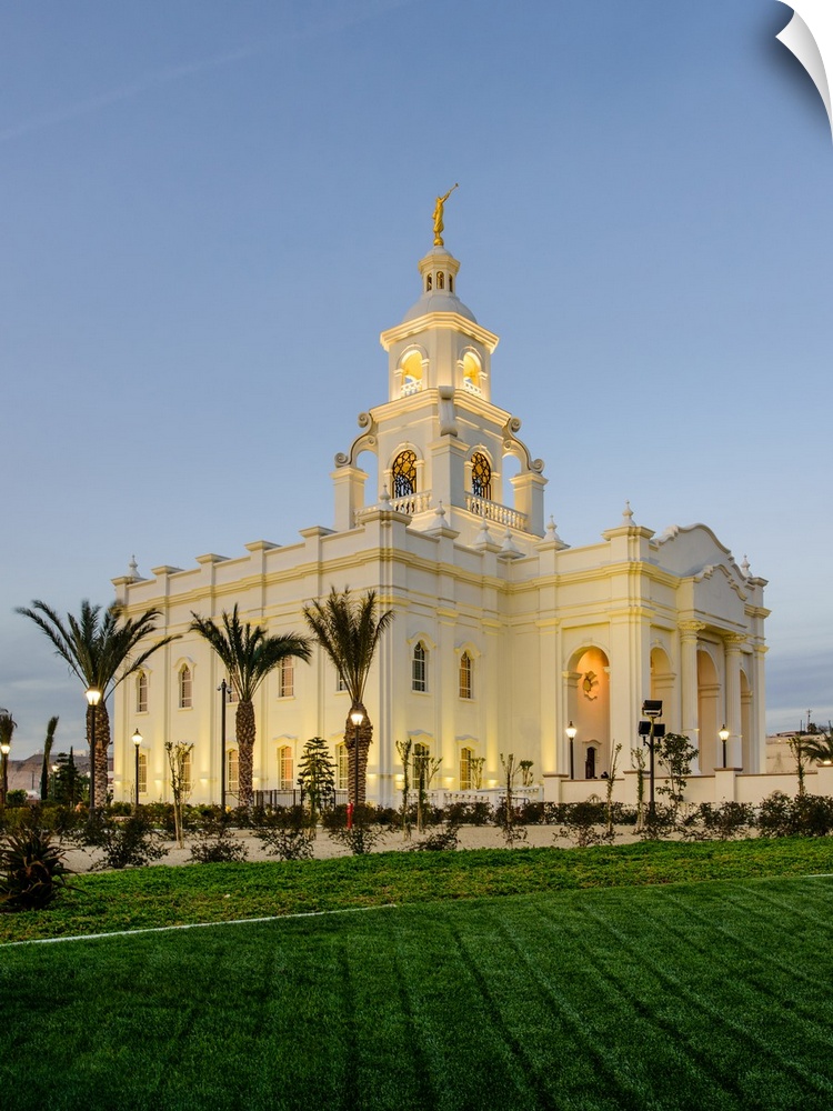 The Tijuana Mexico Temple is located in Baja California. The entrance of the temple is adorned with palm trees, a water fe...
