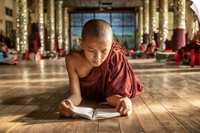 Burmese Monk Reading In His Monastery