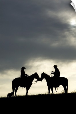 Cowboy and cowgirl silhouette at sunset, Yosemite, California