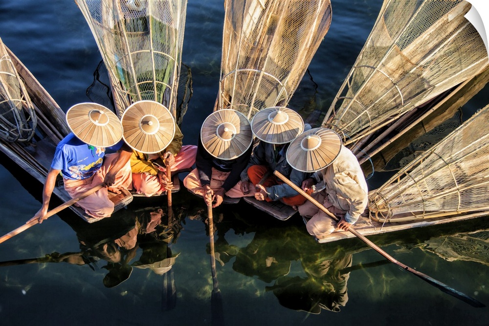Fisherman on their longtail boats in Inle lake, Burma