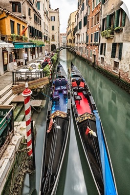 Gondolas after dark in Venice, Italy
