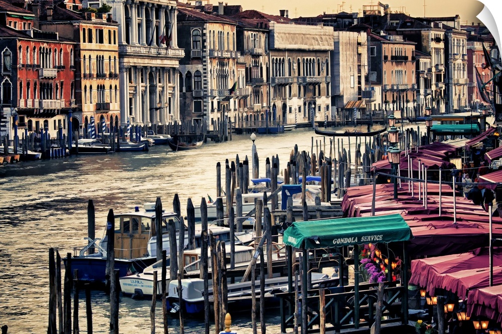 Photograph of the famous gondola boats on the river in Venice, Italy.