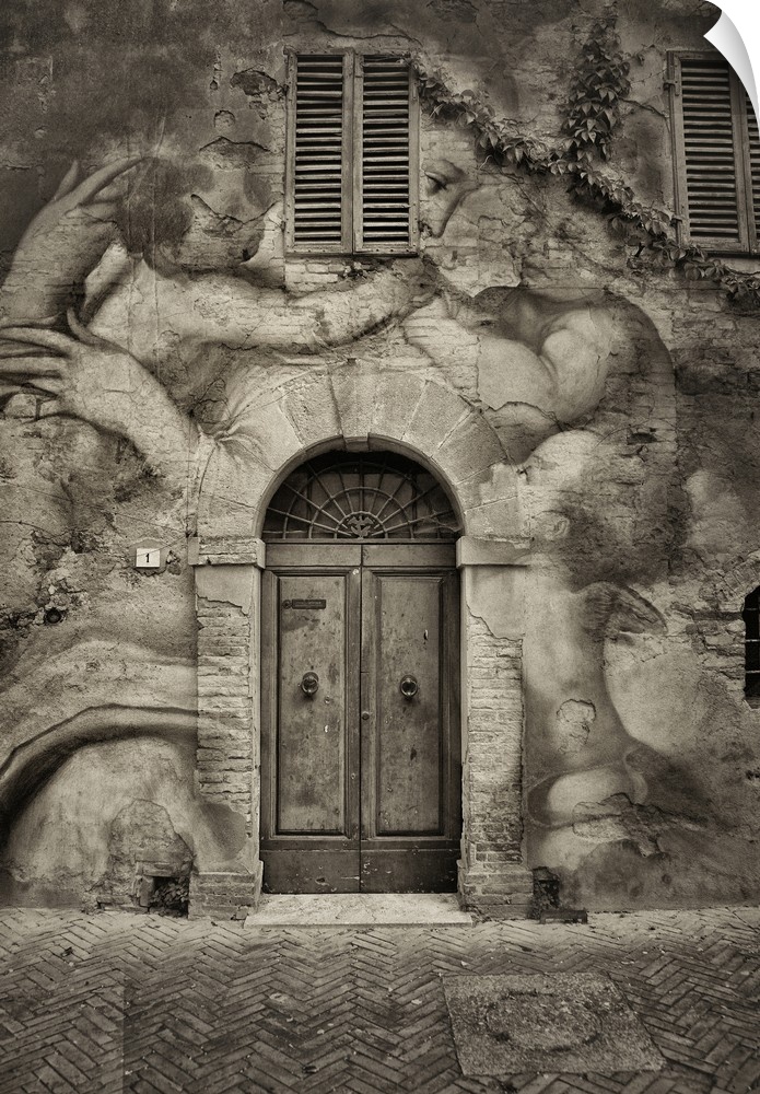 Painted wall and door in Florence, Italy