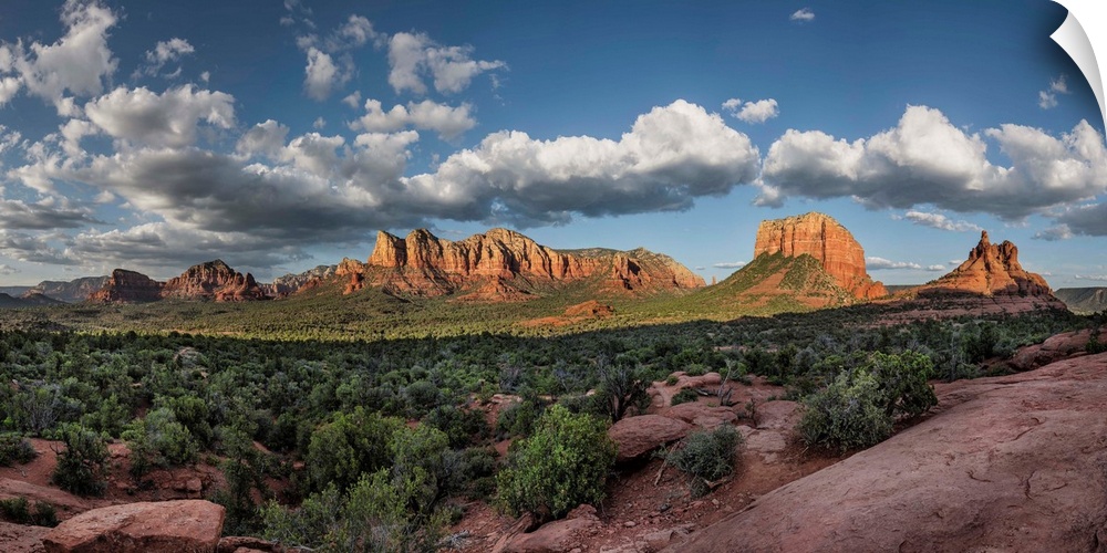 Panorama of clouds and red rocks at sunset in Sedona, Arizona.