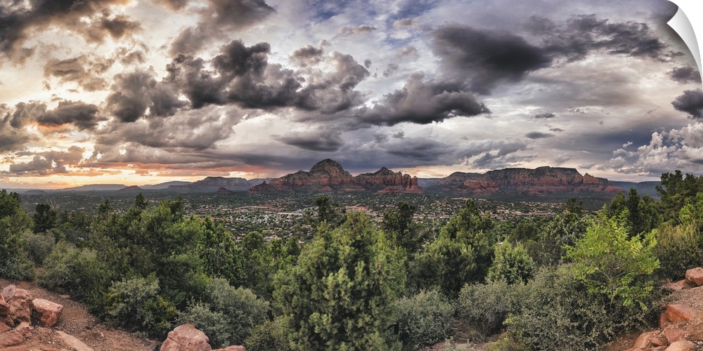 Panorama of clouds and red rocks in Sedona, Arizona.