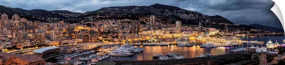 Panorama of Monte Carlo and the harbor after dark.