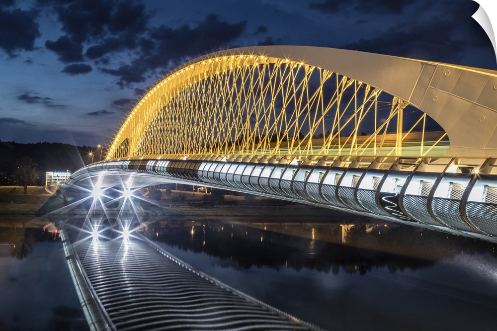 The modern Troja Bridge in the Czech Republic at dusk.