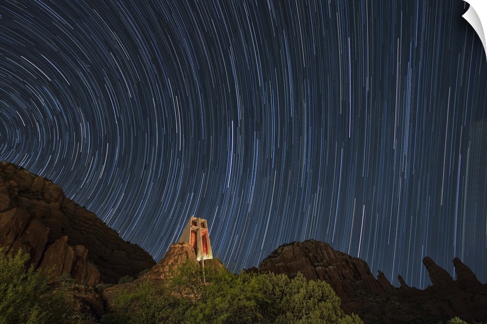 Star trails above the Chapel of the Holy Cross in Sedona, Arizona