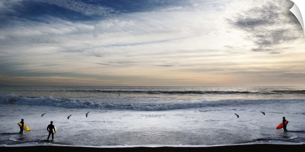 Surfers in Malibu looking at the waves