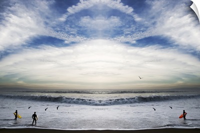Surfers in the ocean, Malibu, California