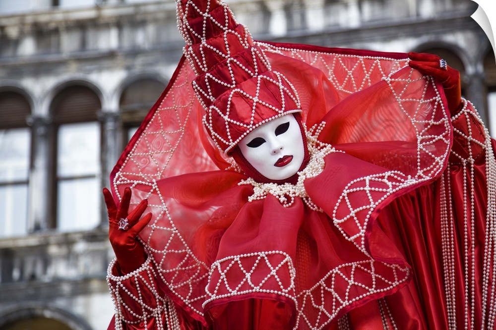 Woman in masquerade outfit at Carnival in Venice, Italy.