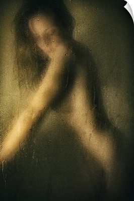 Woman leaning on hands in the shower
