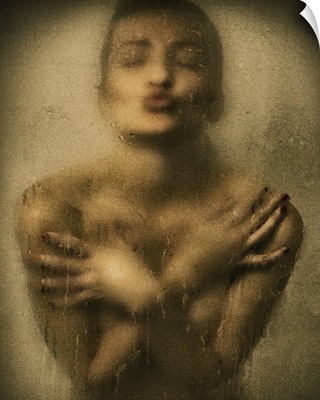 Woman with her hands across her chest in the shower