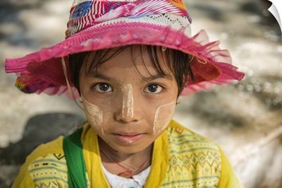 Young Burmese girl with Tanaka face paint