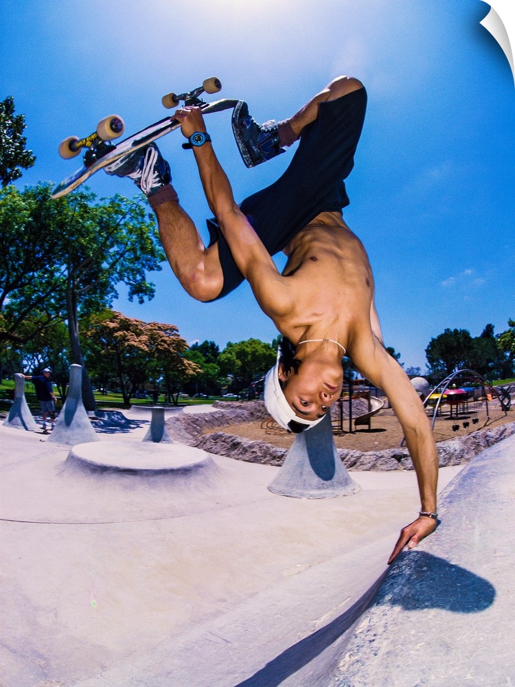 Edwin Carungay grabbing the rail at Sadlands, now Anaheim Skatepark, in Anaheim, California.