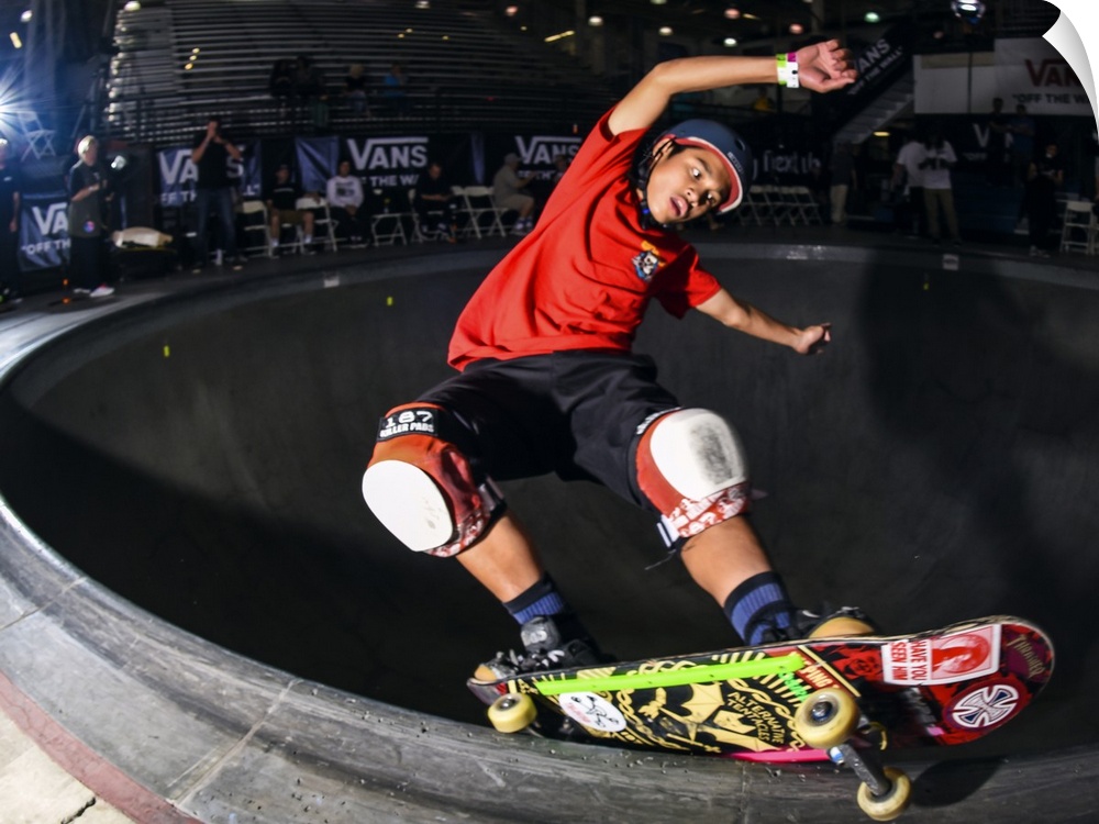Kiko Saucee grinding his skateboard on a railing at Vans Off The Wall Skatepark in Huntington Beach, California, 2016.