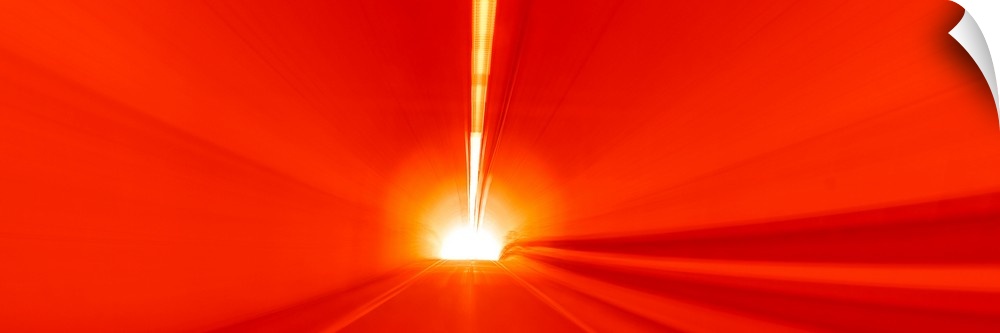 Blurred motion image of light trails in a tunnel in San Francisco, California.