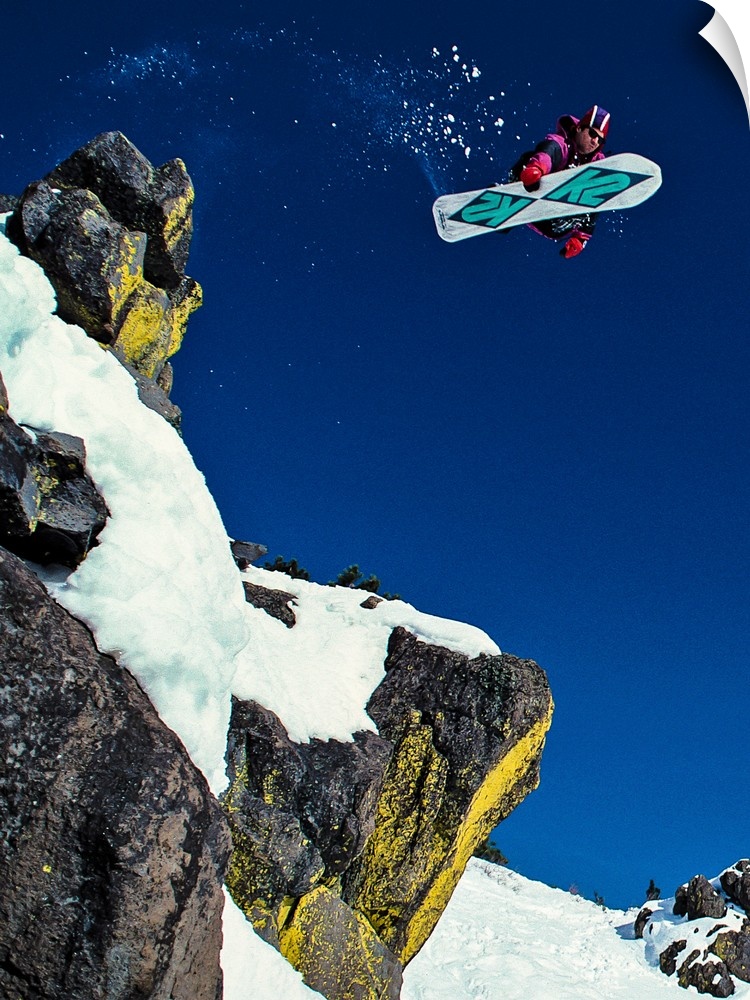 Shawn Farmer snowboarding through the air at Lake Tahoe, California, 1992.