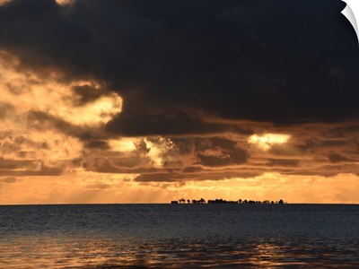 Storm clouds over the ocean in Belize at sunset