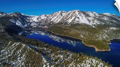 The highly relfecitve nature of Lake Tahoe on a crisp winter morning