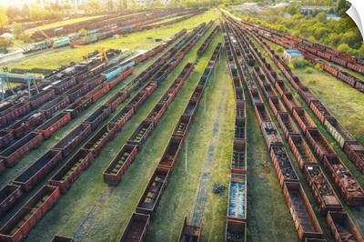 Aerial View Of Old, Rusty, Freight Trains On A Railroad
