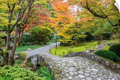 Fall Foliage and Stone Bridge in lush Garden