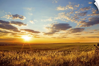Russia, The Sun Rises In The Morning Above Endless Fields Of Hills And Meadows