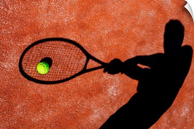 Tennis Player's Shadow on a Tennis Court