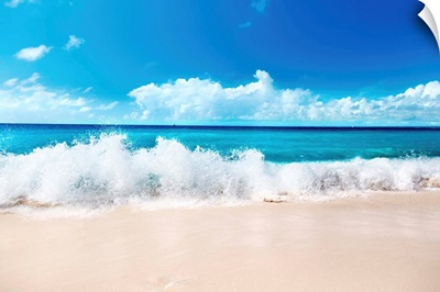Tide washing over Caribbean beach.